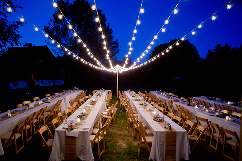 barn wedding large bistro lights outdoor dinner